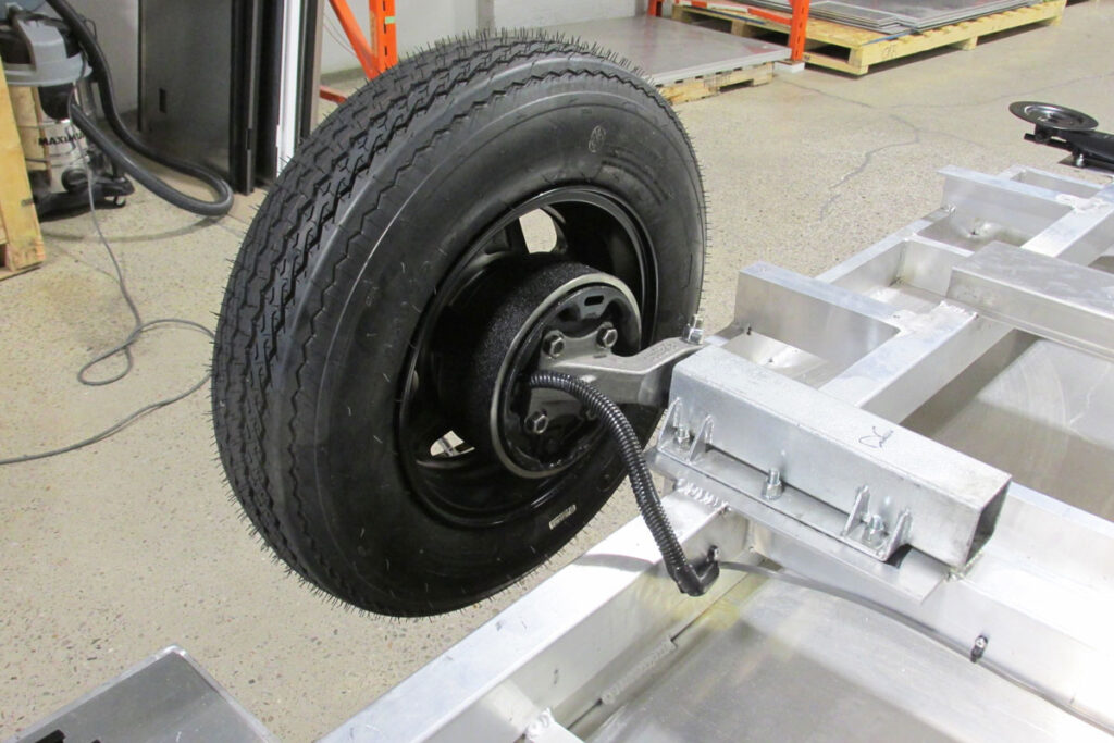torsion axle mounted to an aire80 tent trailer