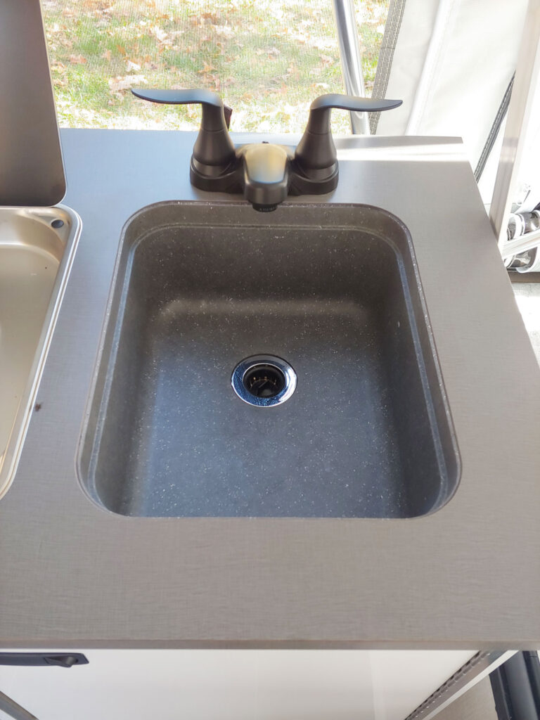 deep kitchen undermount sink with matte black faucet